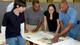 Students review potential site plans for the new development in a file photo. From left are Juton Horstman, Shalanski White, Nicole Adair and Stephen Gage.